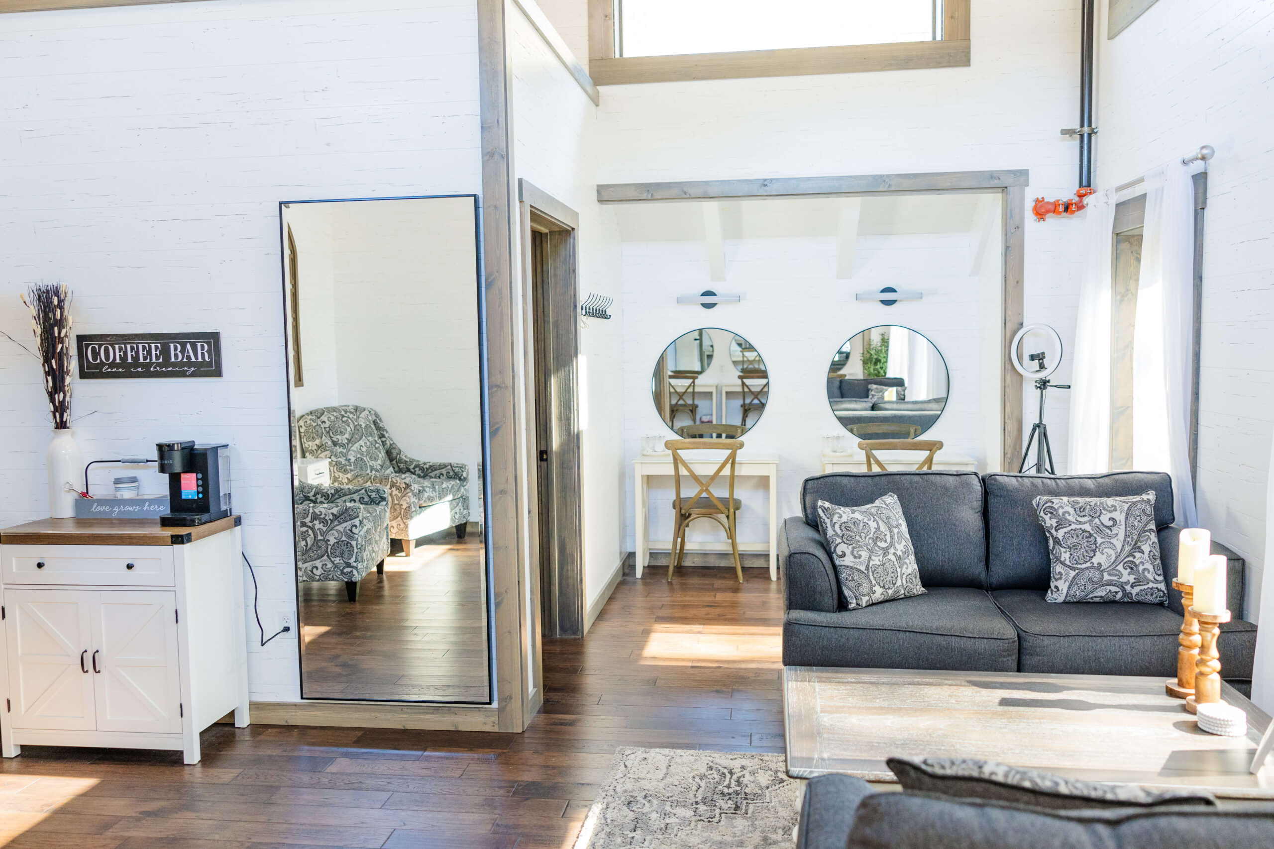 A look at the bridal getting ready suite with couches and coffee bar